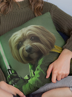 A person in a green sweater holds a Custom Star Wars Pet Cushion, showcasing an illustration of a dog as a Jedi with a green lightsaber.